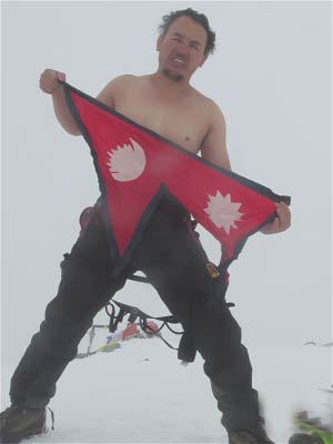 Sanjay-Pandit-holding-a-Nepal-flag